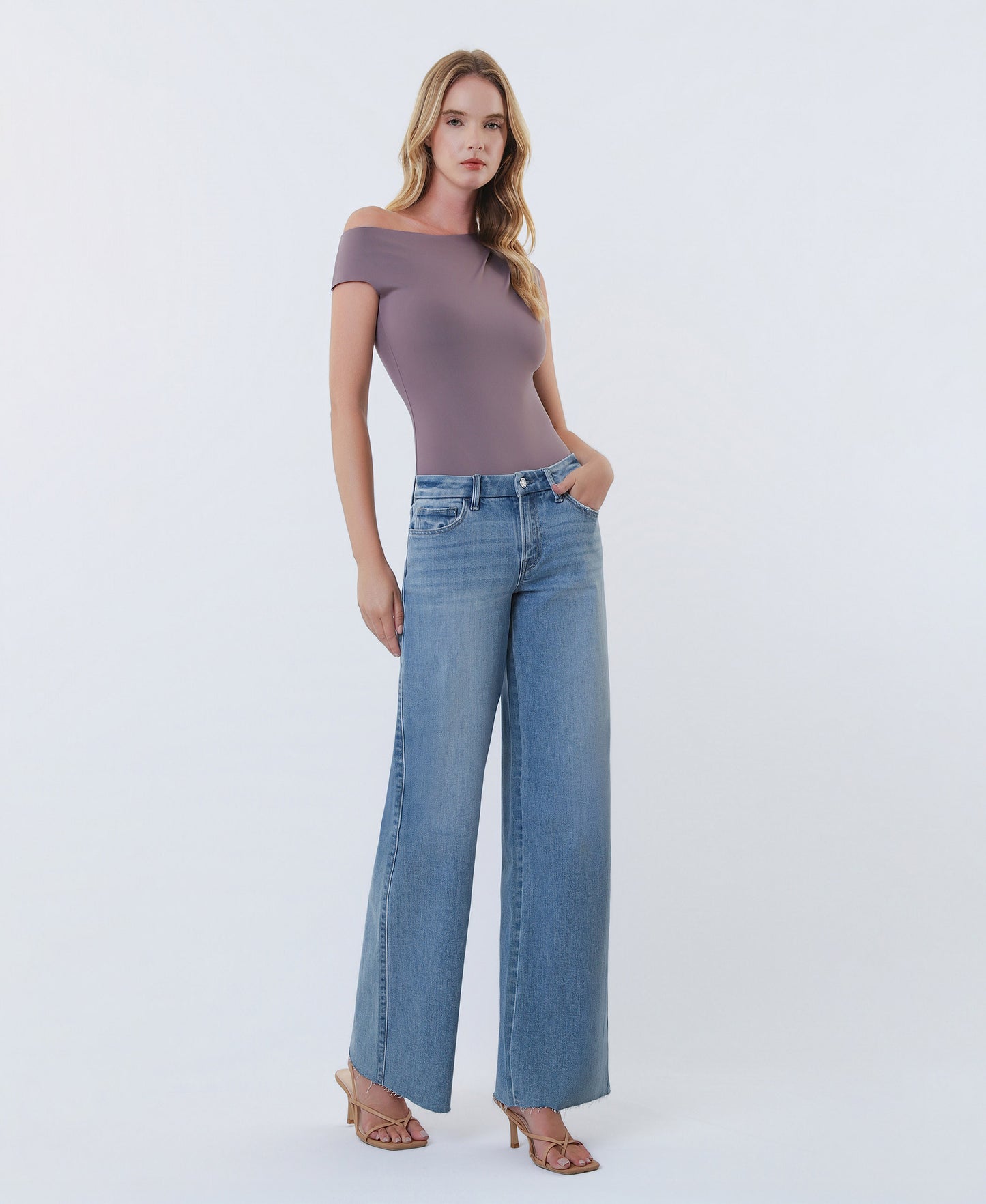 Right 45 degrees product image of Light - Mid Rise Clean Cut Raw Hem Wide Leg Jeans