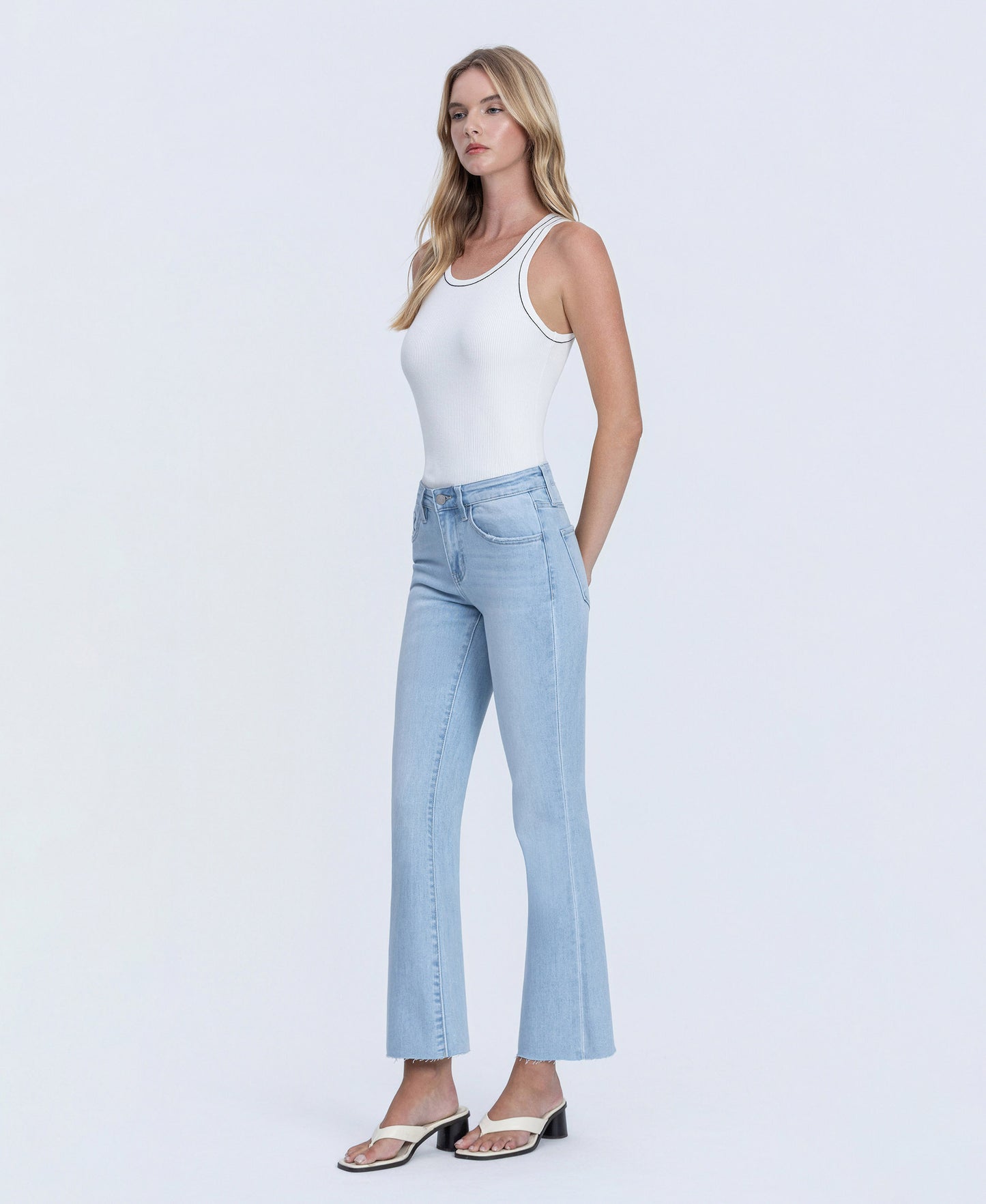 Left 45 degrees product image of Uplift - Mid Rise Raw Hem Ankle Bootcut Jeans
