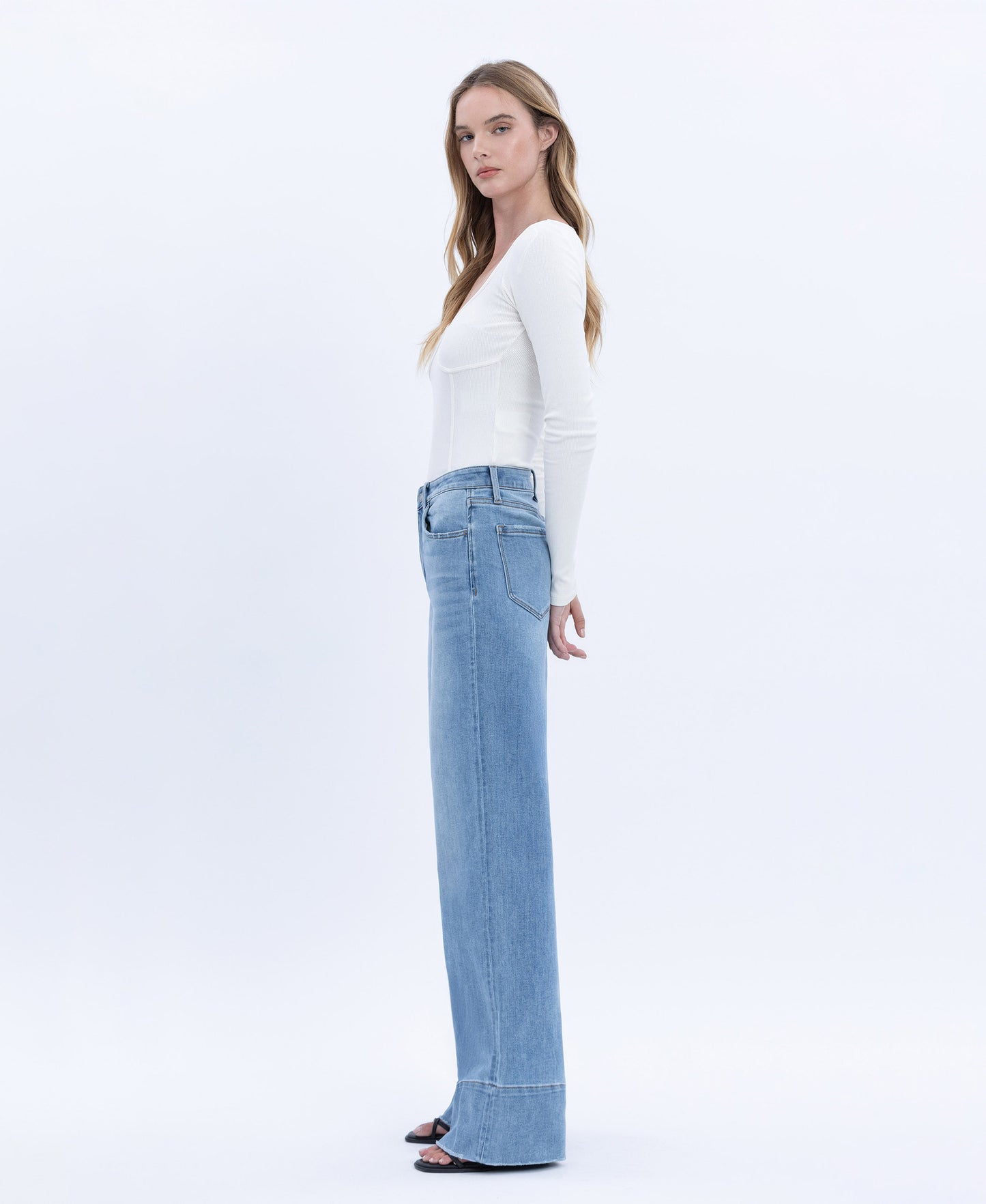 Left side product images of Legitimate - High Rise Raw Hem A-Line Wide Leg Jeans