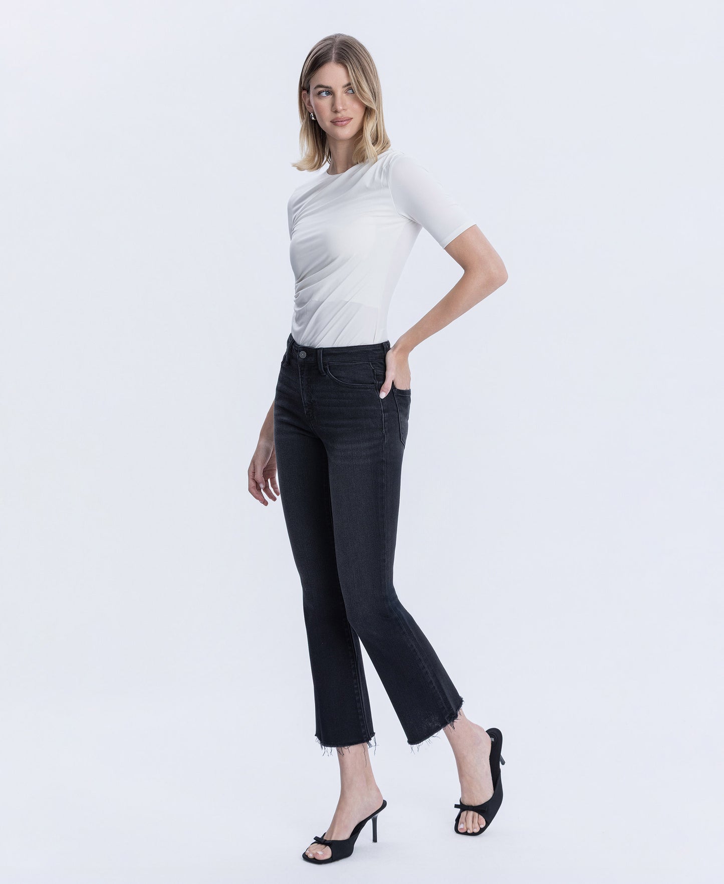 Left 45 degrees product image of Black - High Rise Raw Hem Ankle Bootcut Jeans