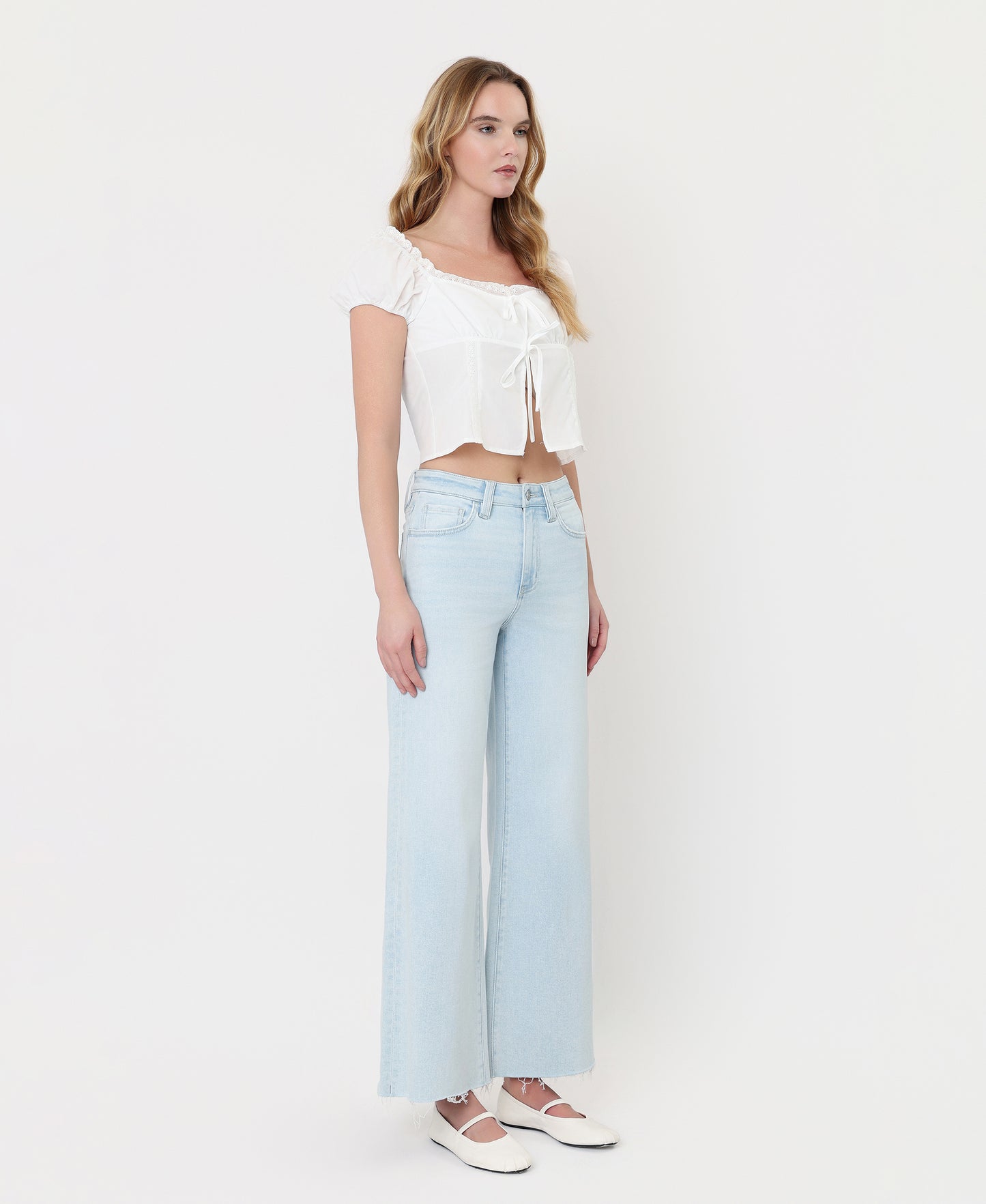 Right 45 degrees product image of Gainfully - High Rise Clean Cut Raw Hem Wide Flare Jeans