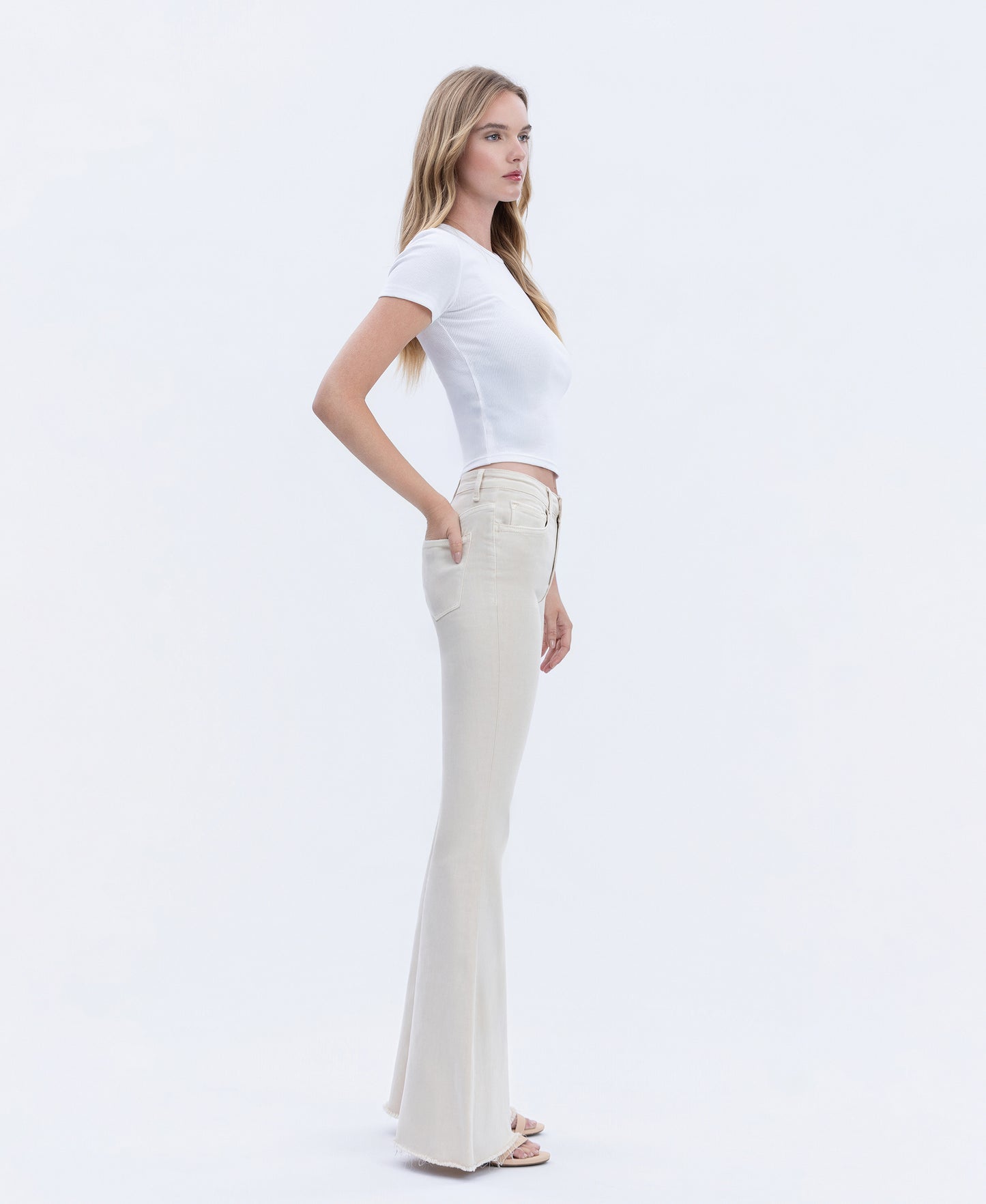 Right 45 degrees product image of Parchment - High Rise Raw Hem Super Flare Jeans