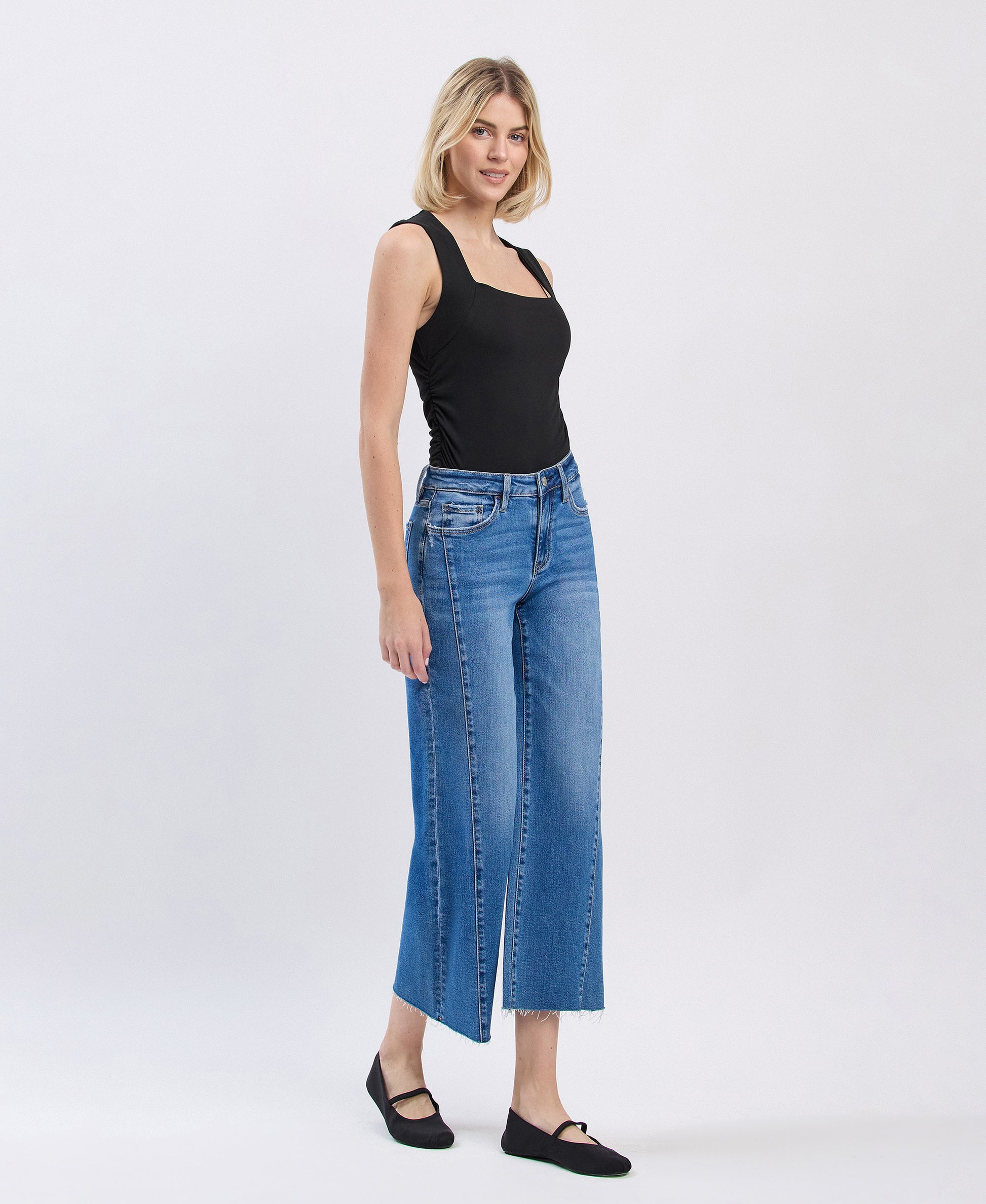 Right 45 degrees product image of Punctual - High Rise Raw Hem Twist Wide Leg Jeans