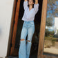editorial image of Sunny Plains - Super High Rise 90's Vintage Flare Denim Jeans