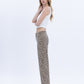 Left side product images of Leopard - High Rise Animal Print Raw Hem Crop Wide Leg Jeans