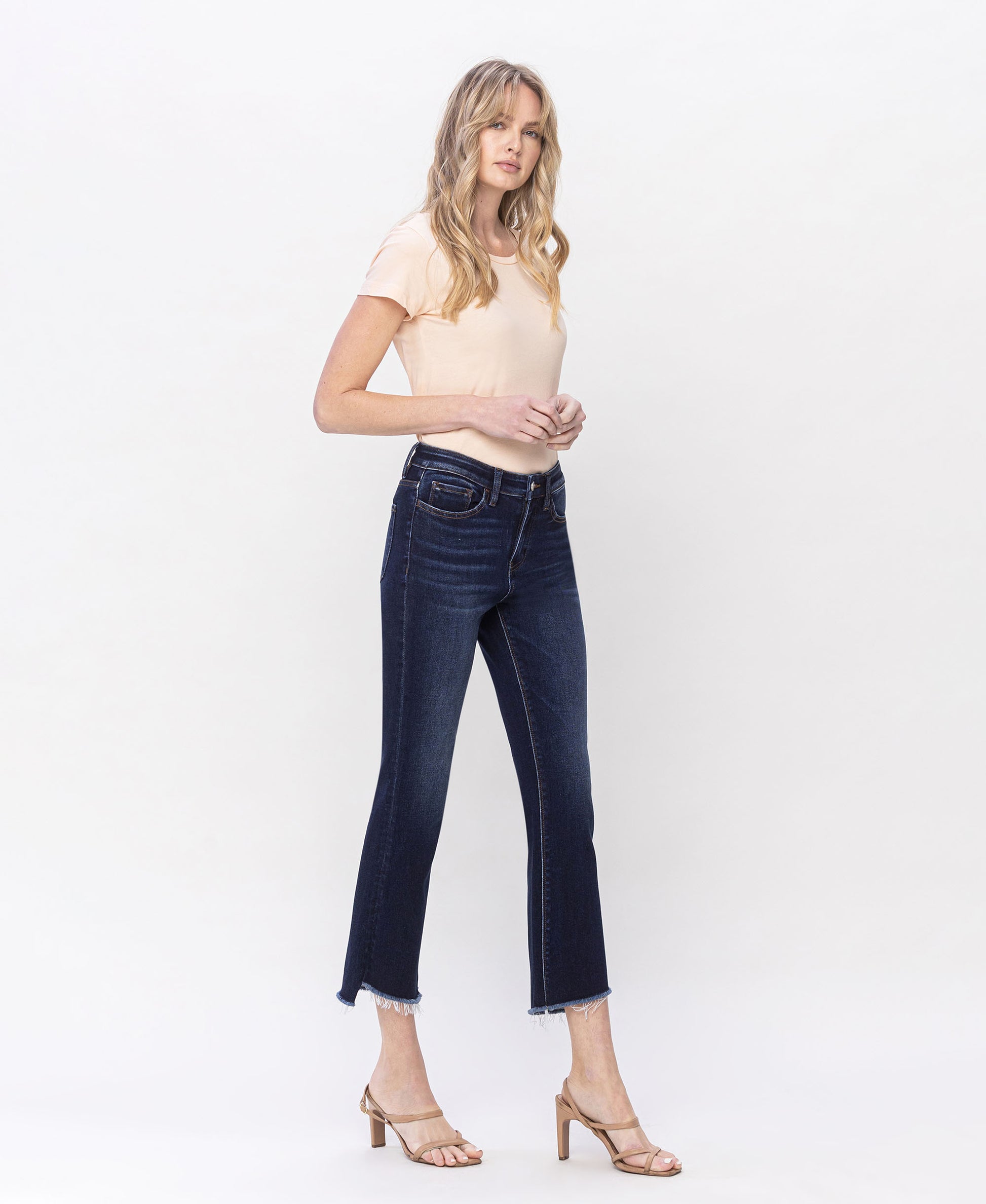 Right 45 degrees product image of Motivated - High Rise Step Raw Hem Crop Flare Jeans