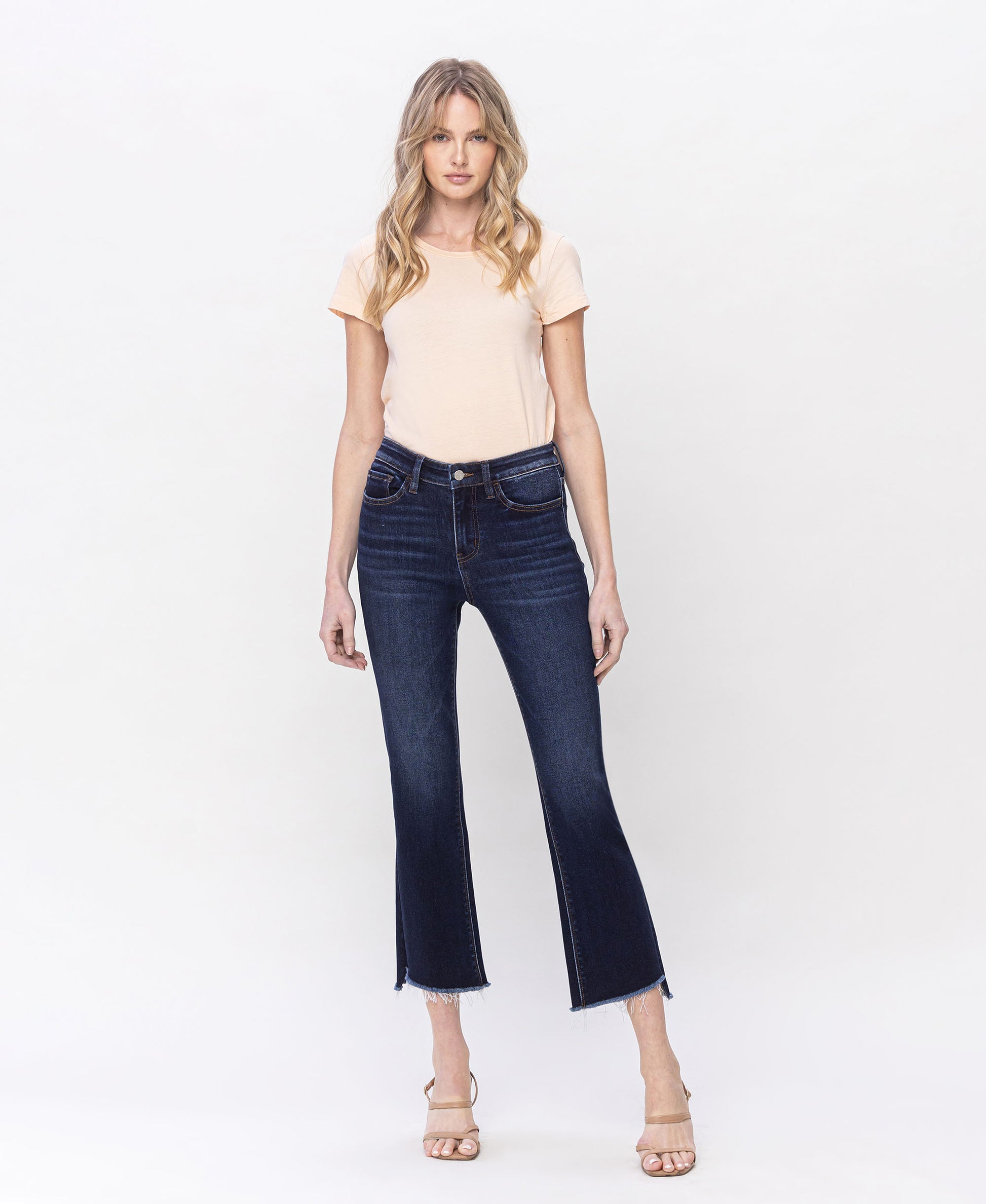 Front product images of Motivated - High Rise Step Raw Hem Crop Flare Jeans