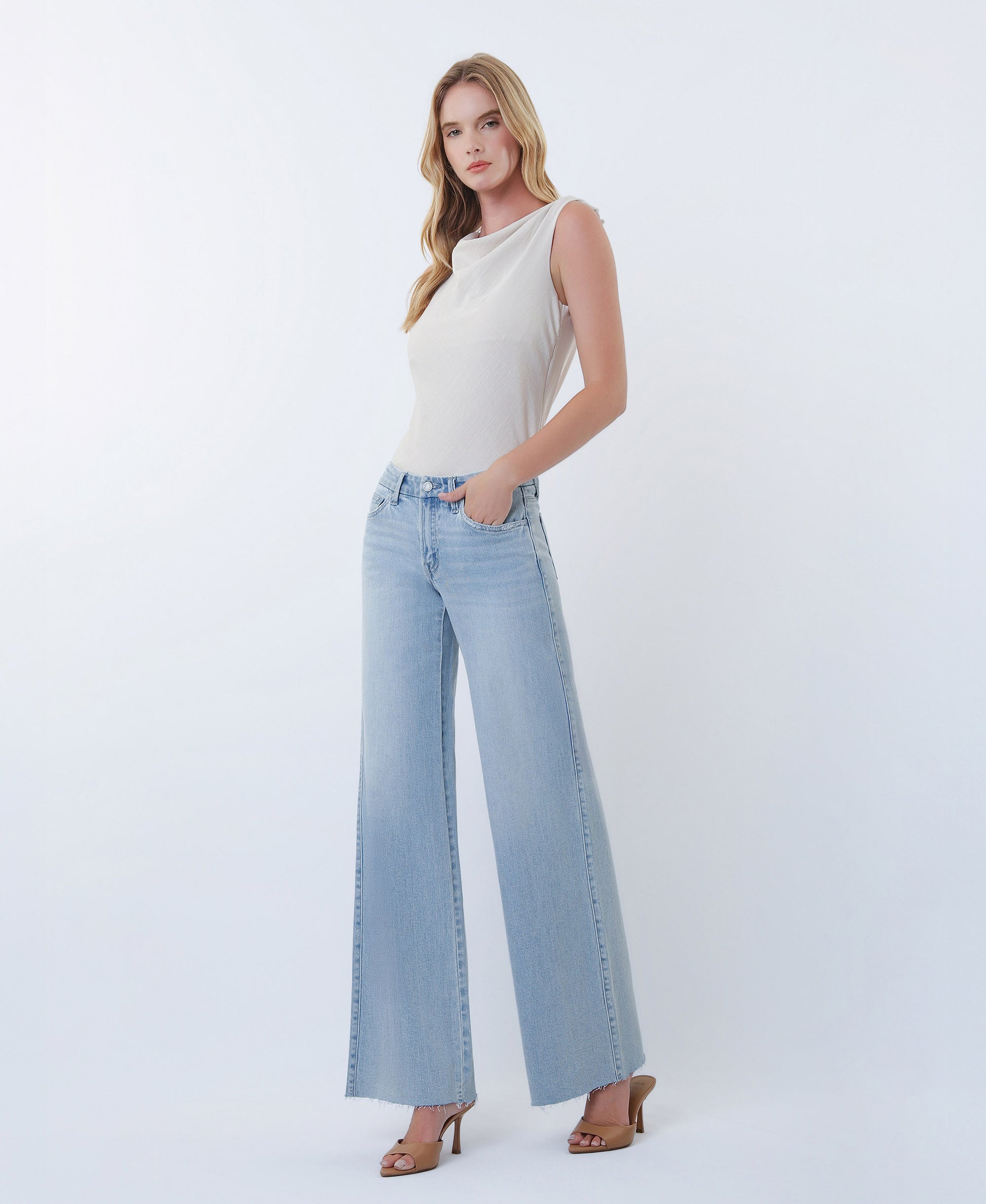 Left 45 degrees product image of Super Light - Mid Rise Clean Cut Raw Hem Wide Leg Jeans