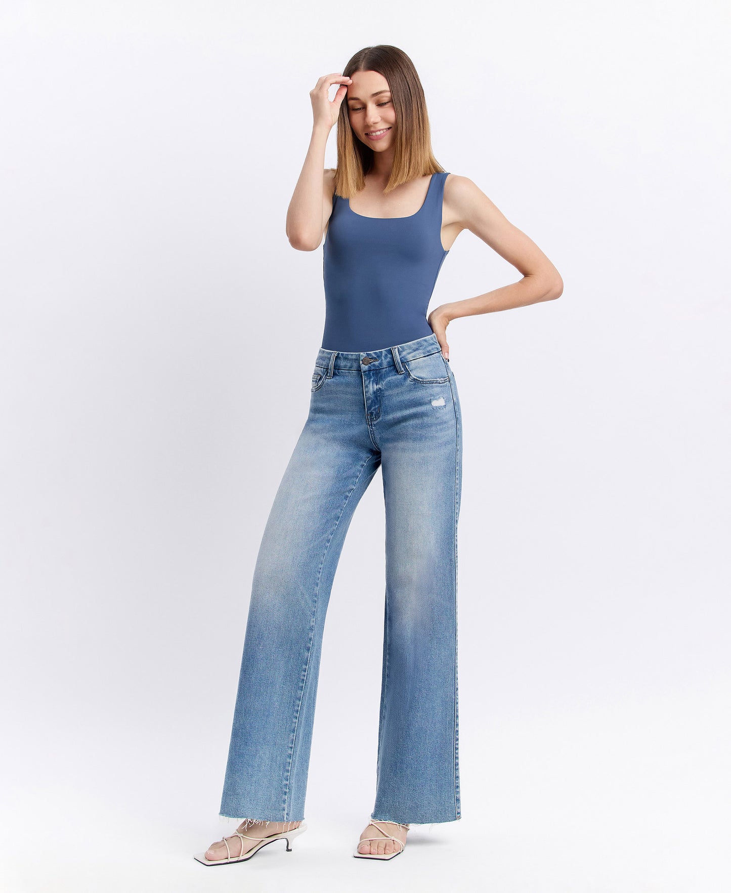 Left 45 degrees product image of Vouchsafe - Mid Rise Clean Cut Raw Hem Wide Leg Jeans