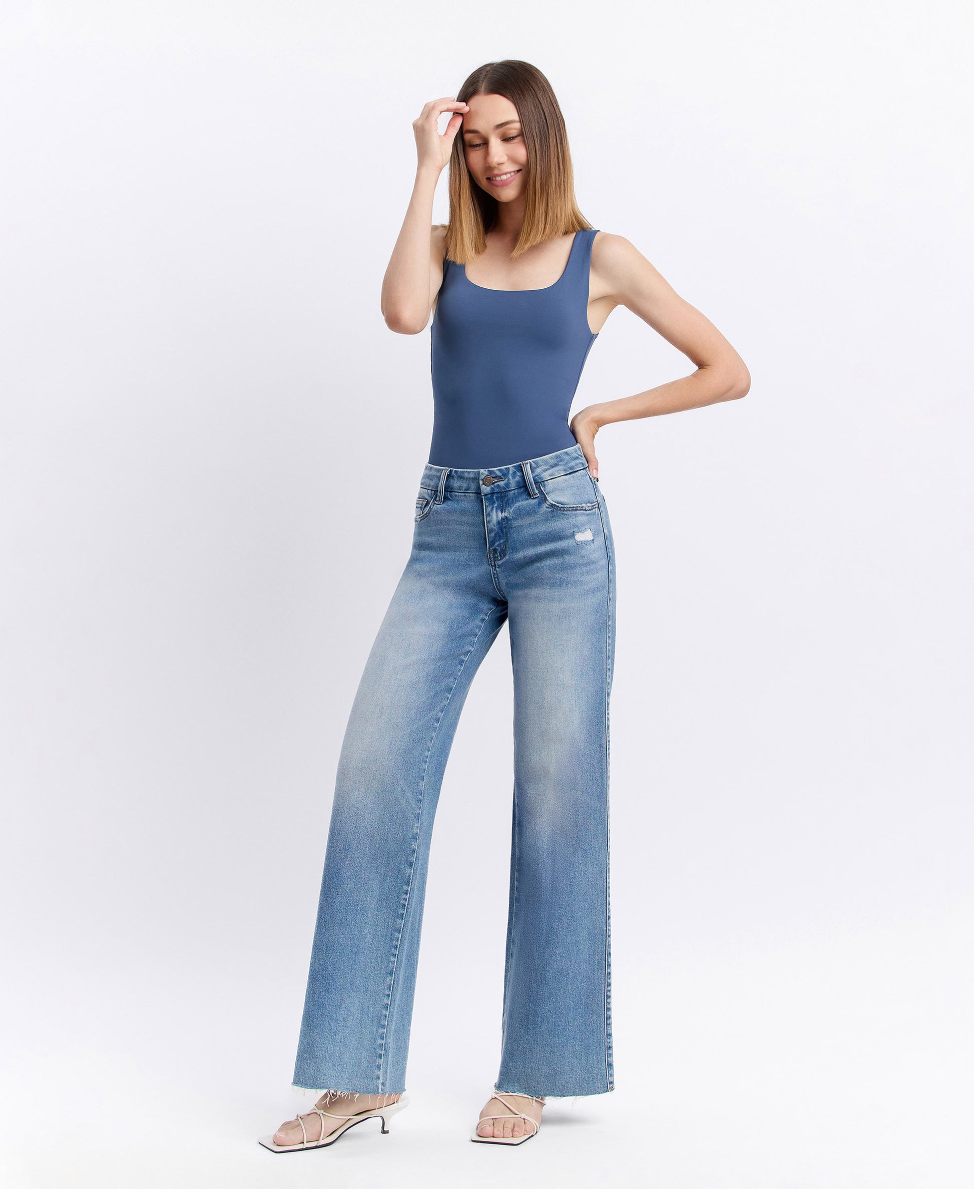 Left 45 degrees product image of Vouchsafe - Mid Rise Clean Cut Raw Hem Wide Leg Jeans