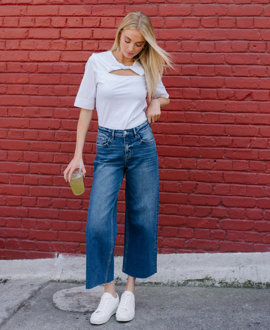 EDITORIAL IMAGE OF Upgraded - High Rise Raw Hem Crop Wide Leg Jeans