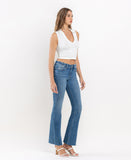 Right 45 degrees product image of Well Rounded - Mid Rise Raw Hem Ankle Bootcut Jeans