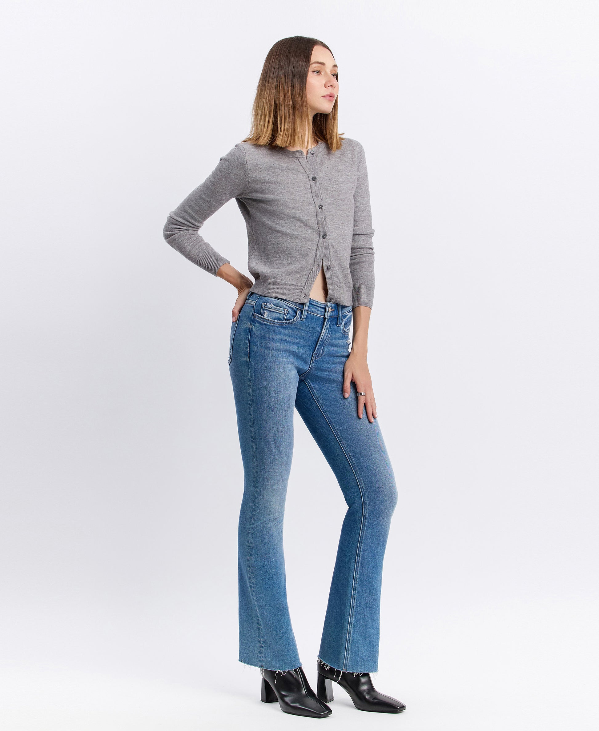 Right 45 degrees product image of Well Rounded - Mid Rise Raw Hem Ankle Bootcut Jeans