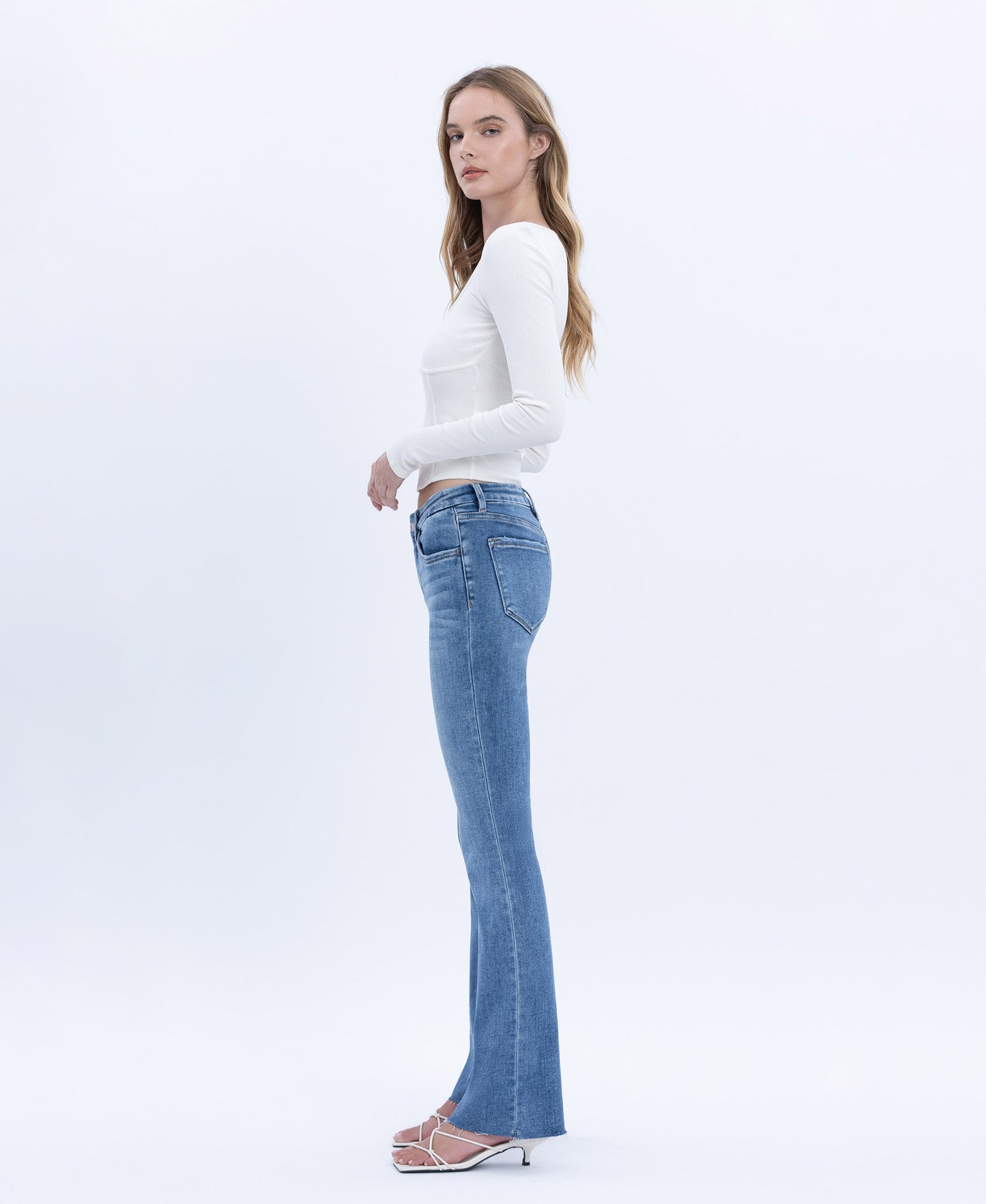 Left side product images of Flores Sea - Mid Rise Seamless Waistband Bootcut Jeans