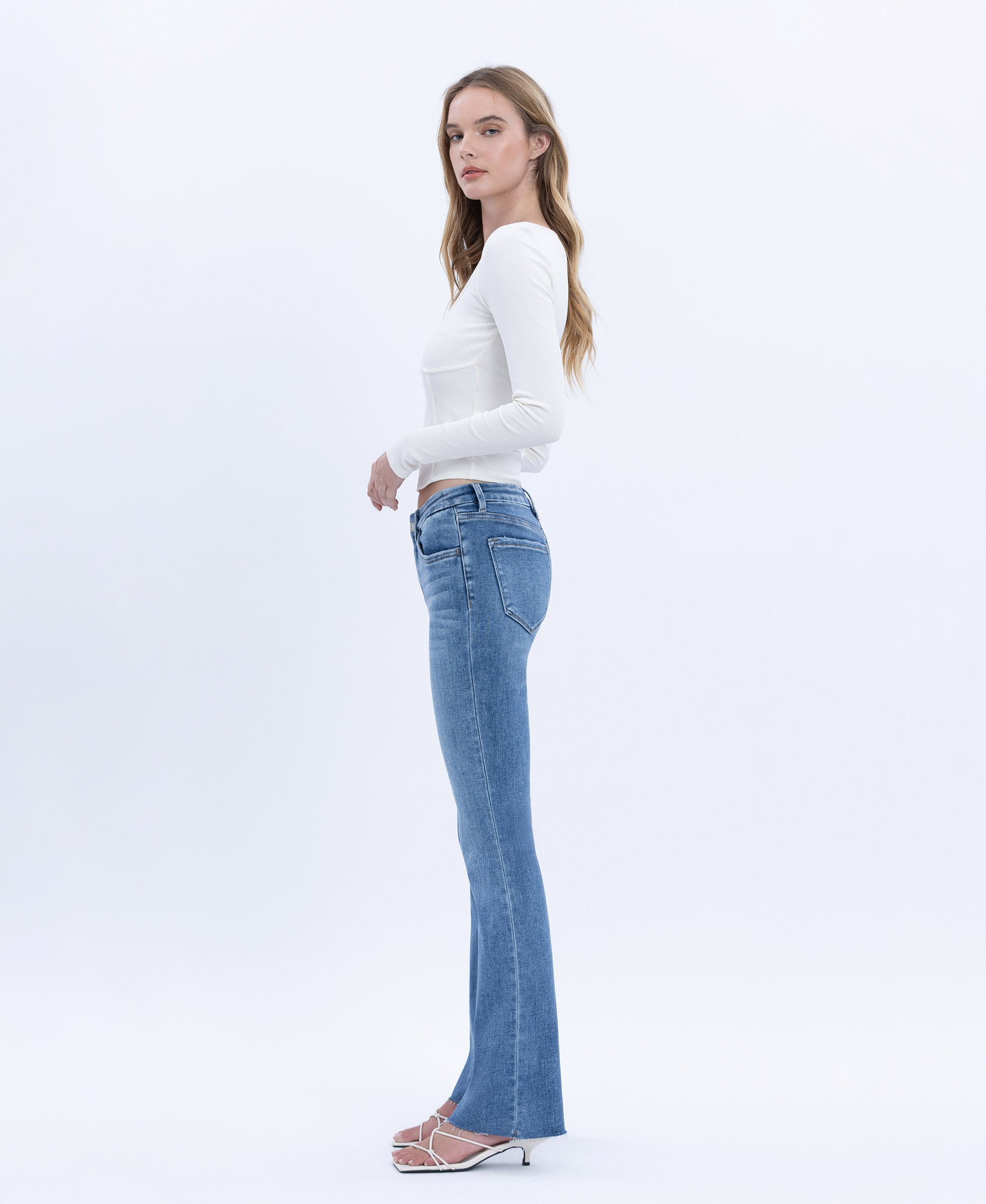 Left side product images of Flores Sea - Mid Rise Seamless Waistband Bootcut Jeans