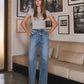 EDITORIAL IMAGE OF Leaping Water - 90's Super High Rise Wide Leg Jeans