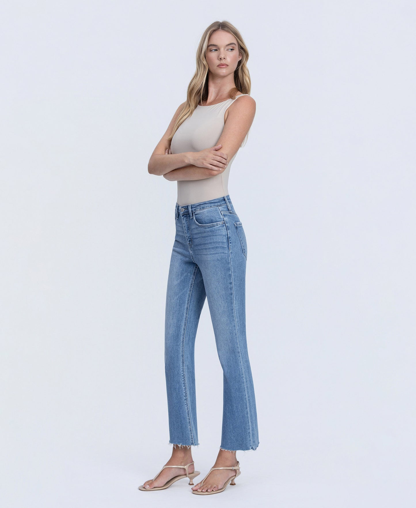 Left 45 degrees product image of Reptar - High Rise Raw Hem Crop Flare Jeans