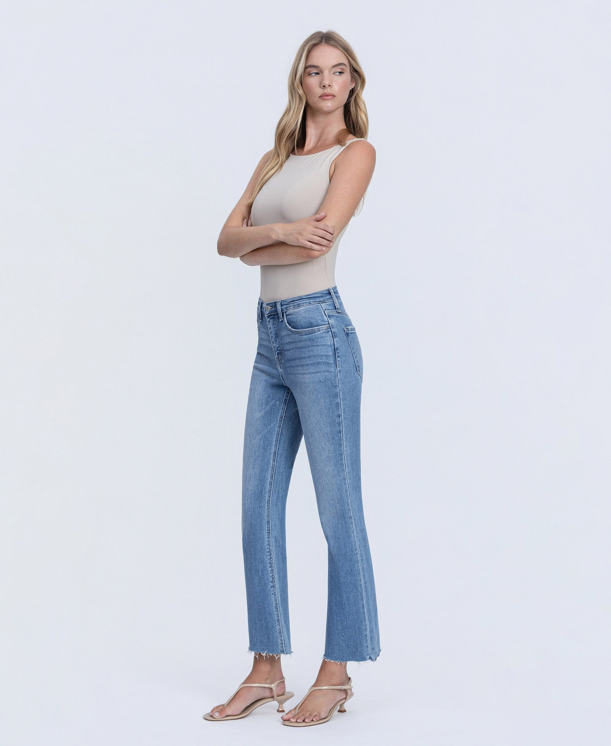 Left 45 degrees product image of Reptar - High Rise Raw Hem Crop Flare Jeans