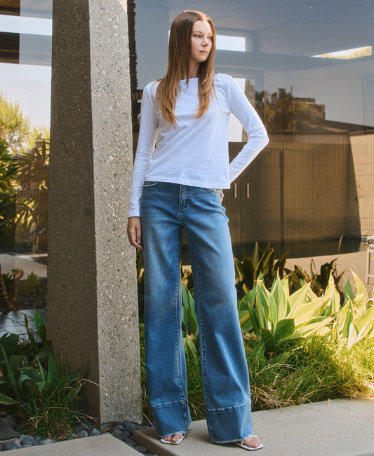 editorial image of Legitimate - High Rise Raw Hem A-Line Wide Leg Jeans