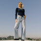 editorial image of Judy - High Rise Raw Hem Wide Leg Jeans