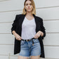 editorial image of 
Riptide - High Rise Raw Hem Relaxed Denim Shorts