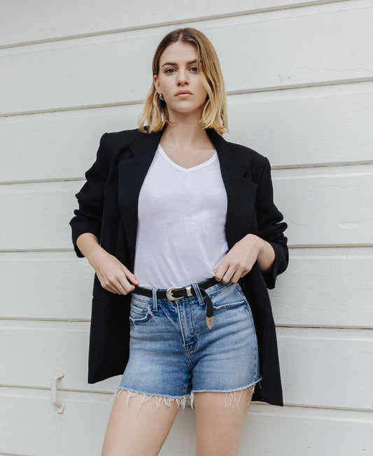 editorial image of 
Riptide - High Rise Raw Hem Relaxed Denim Shorts