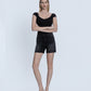 Front product images of Black - High Rise Midi Denim Shorts