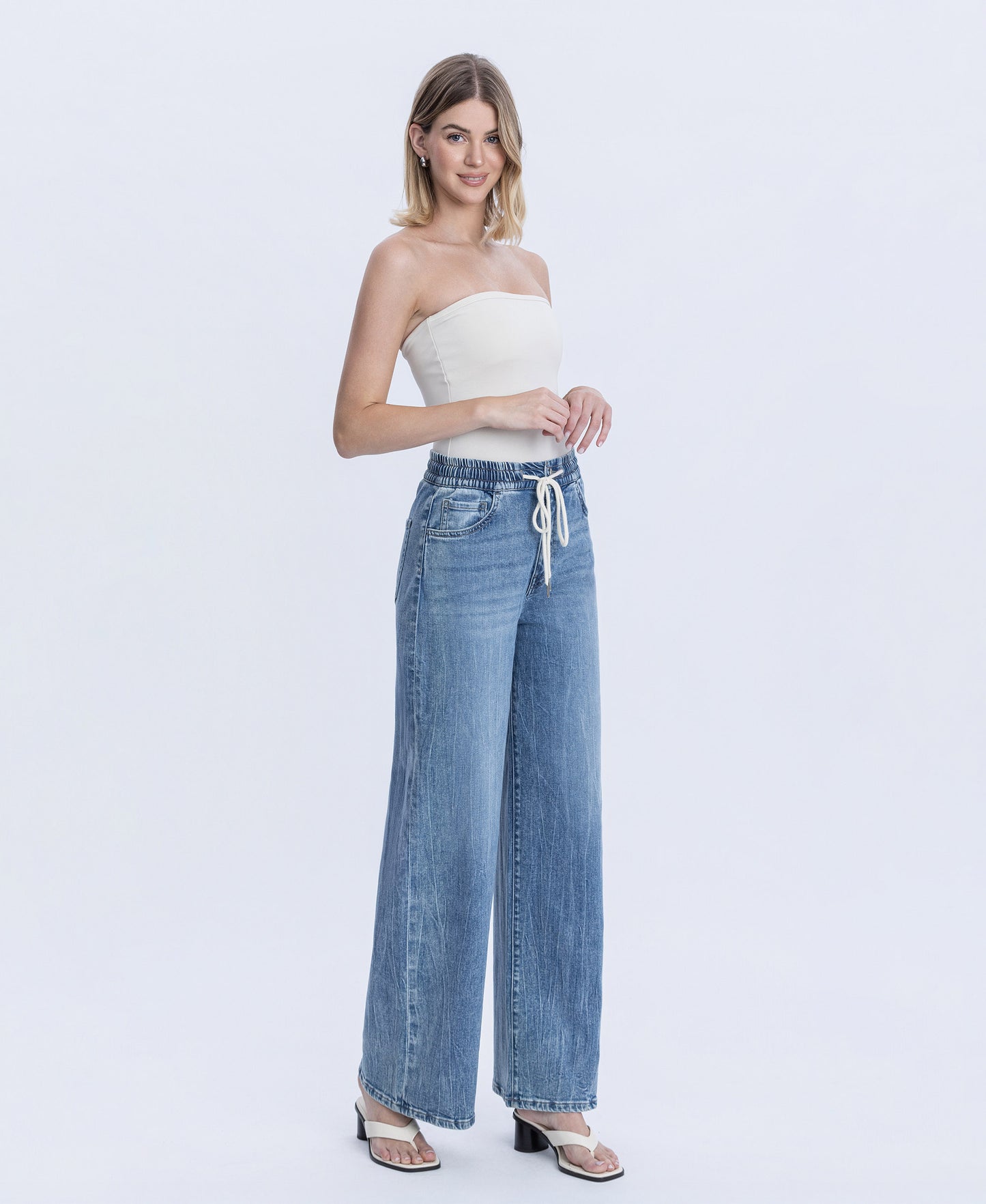 Right 45 degrees product image of Vibrant Essence - Super High Rise Elastic Waistband Wide Leg Jeans