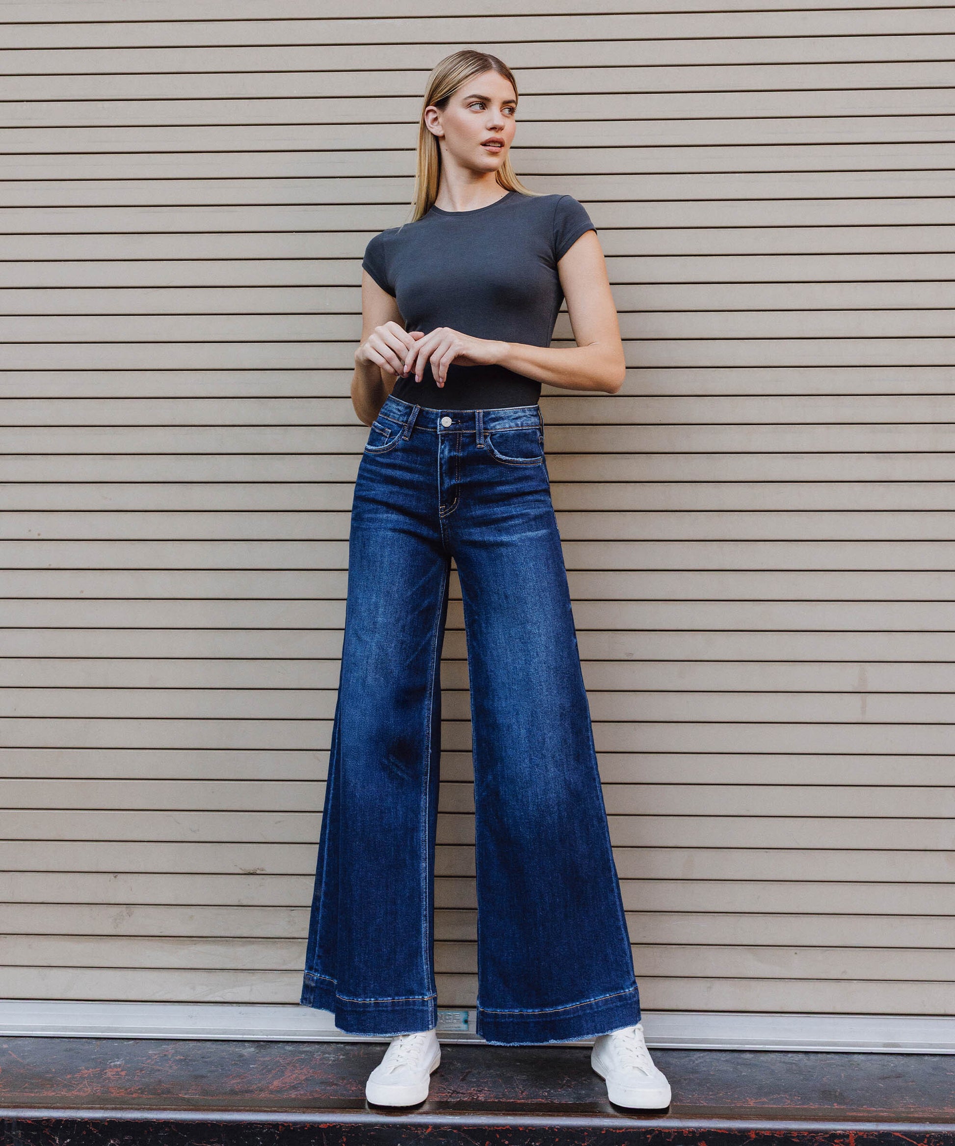 EDITORIAL IMAGE OF Beaming - High Rise Fused Waistband Palazzo Jeans