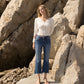 editorial image of Divine - High Rise Distressed Hem Kick Flare Jeans