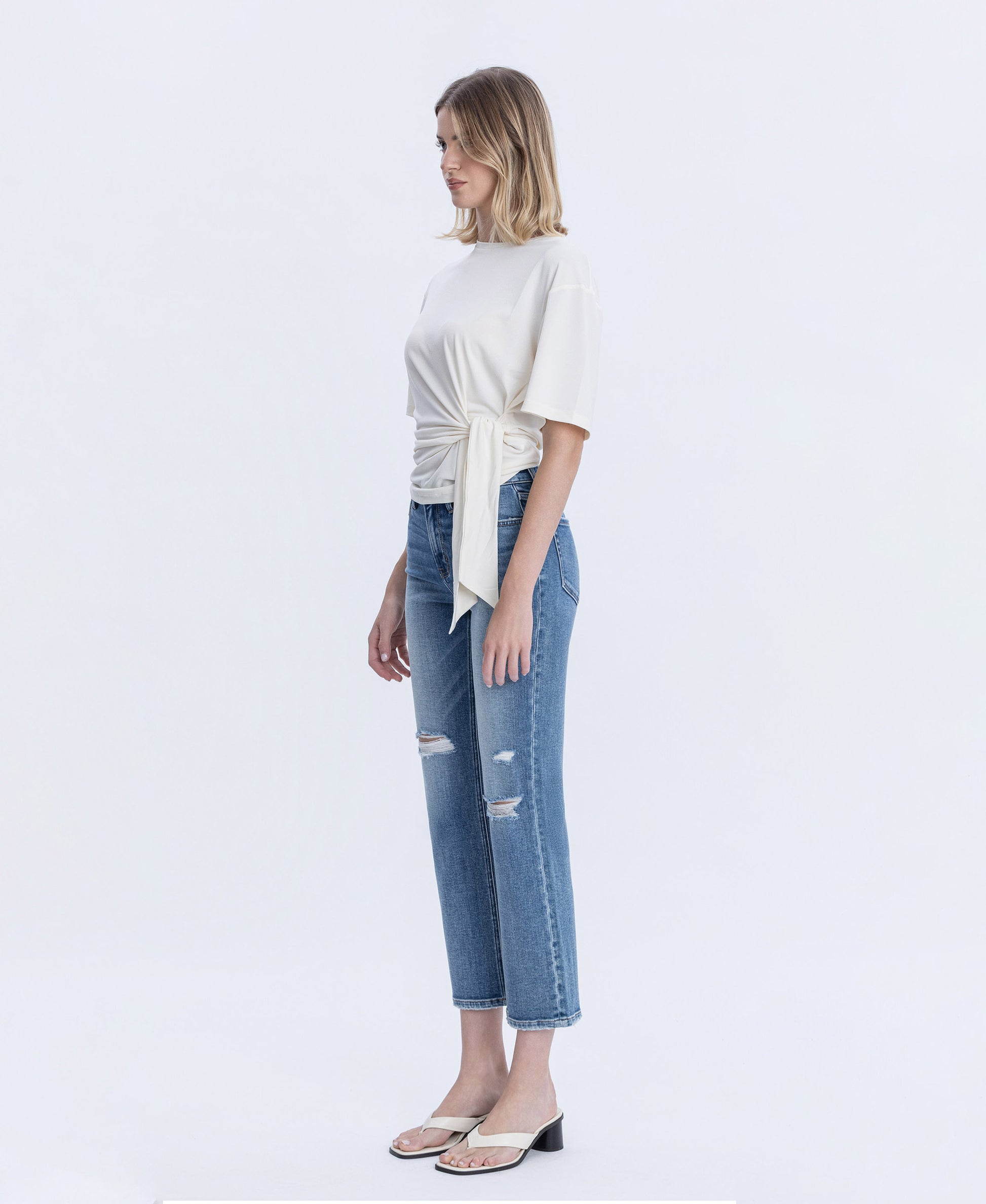 Left 45 degrees product image of Intimacy - High Rise Distressed Ankle Straight Jeans