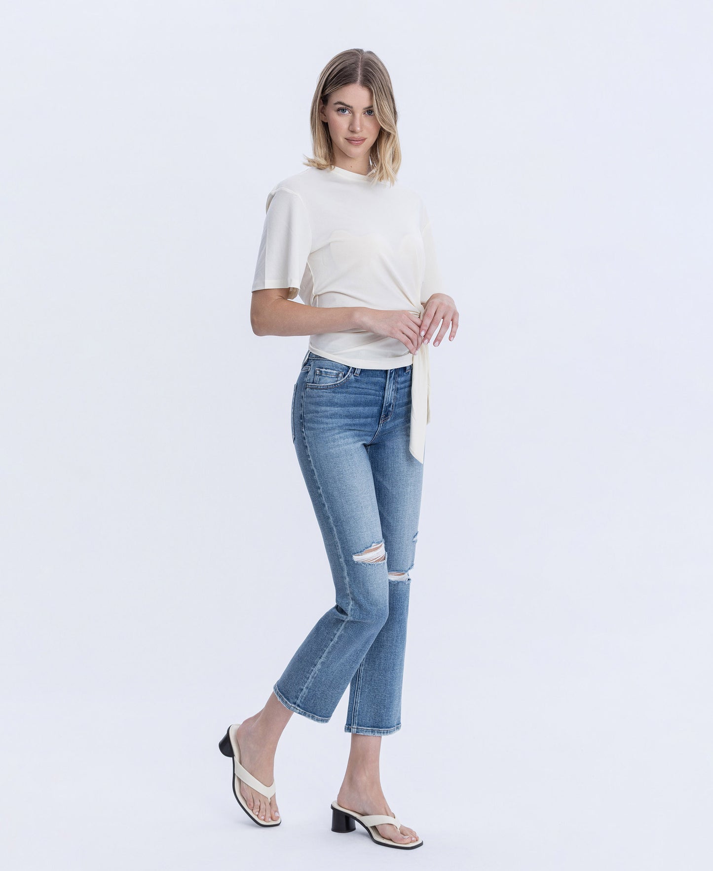 Right 45 degrees product image of Intimacy - High Rise Distressed Ankle Straight Jeans