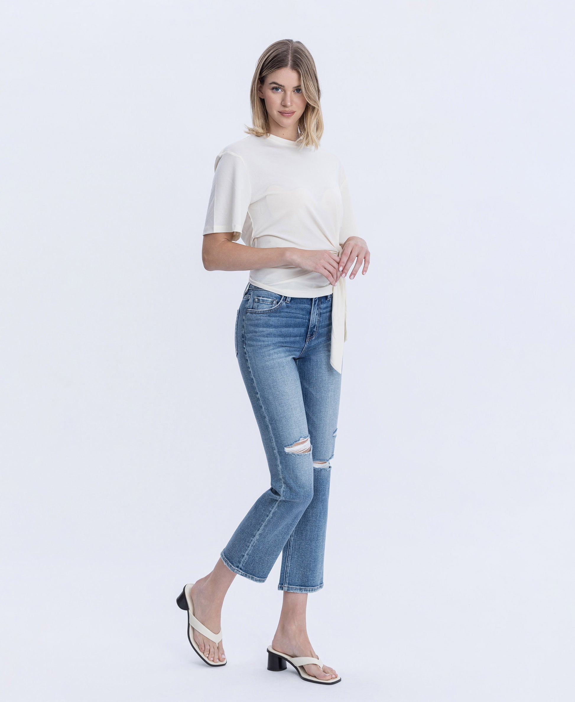 Right 45 degrees product image of Intimacy - High Rise Distressed Ankle Straight Jeans