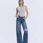 Front product images of Seduction - High Rise Distressed Wide Leg Jeans