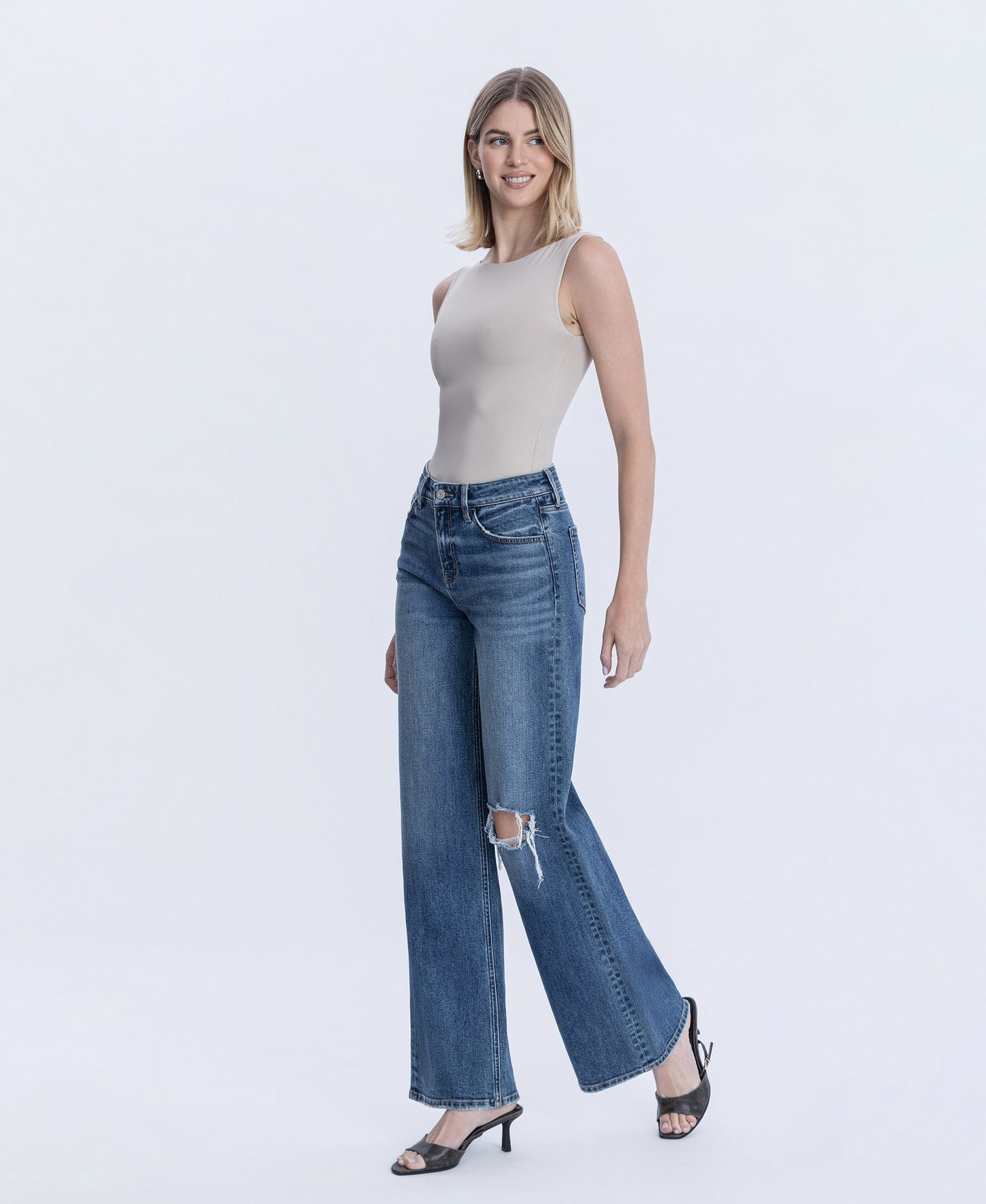 Left 45 degrees product image of Seduction - High Rise Distressed Wide Leg Jeans