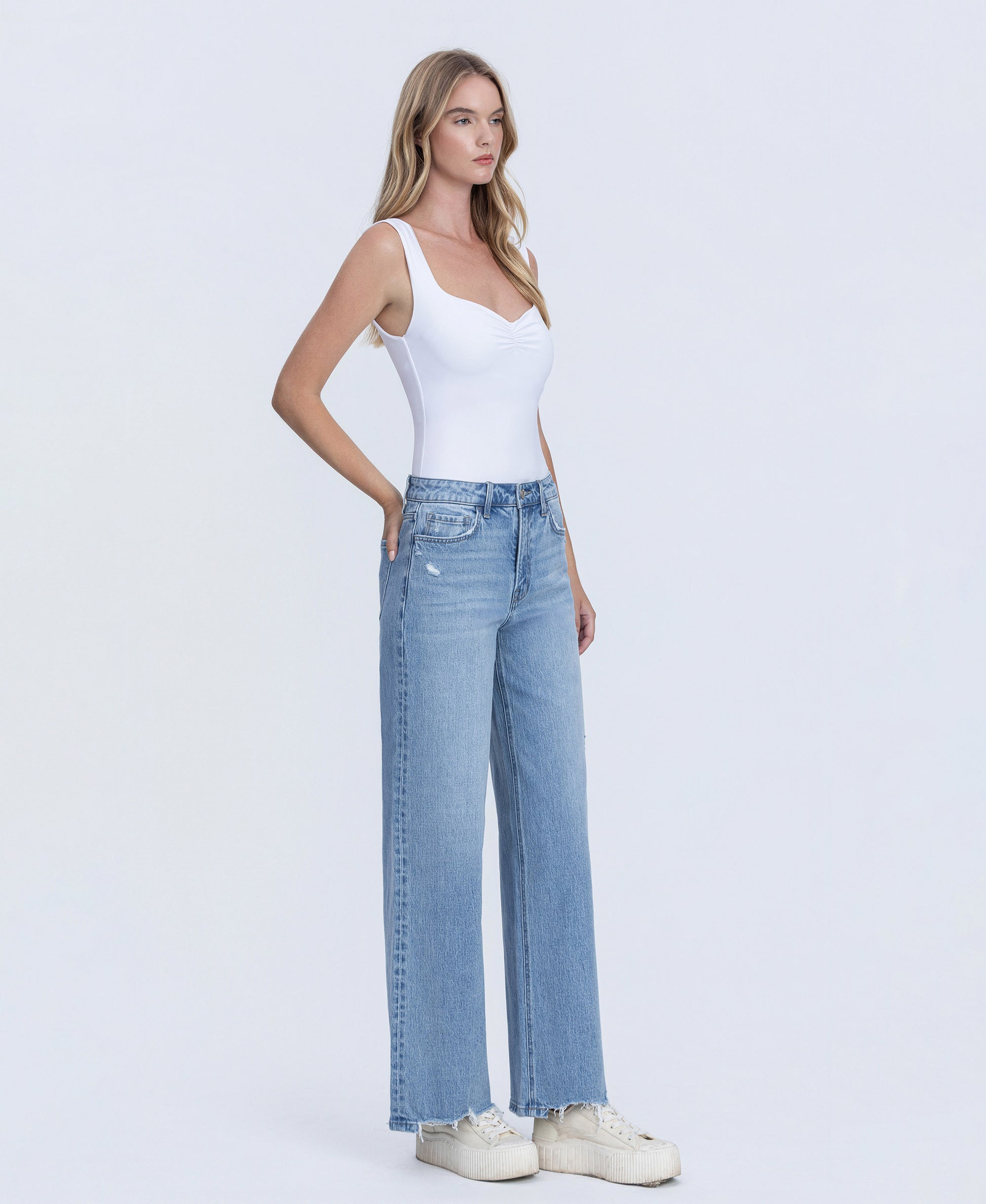 Right 45 degrees product image of Allure - High Rise Distressed Hem Wide Leg Jeans