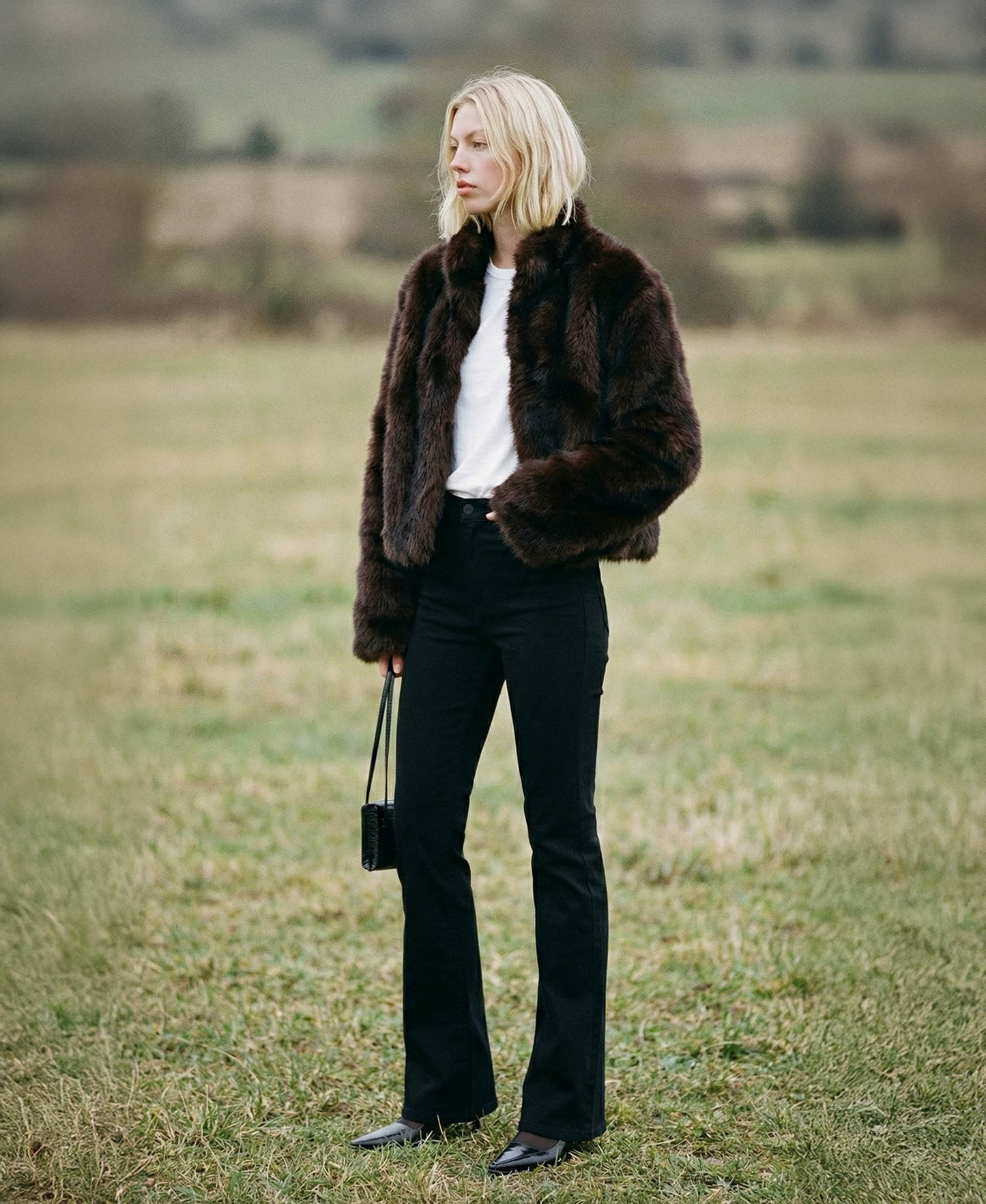 editorial image of Black - Mid Rise Full Length Seamless WB Flare Jeans