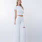 Right 45 degrees product image of Optic White - Mid Rise Distressed Wide Leg Jeans