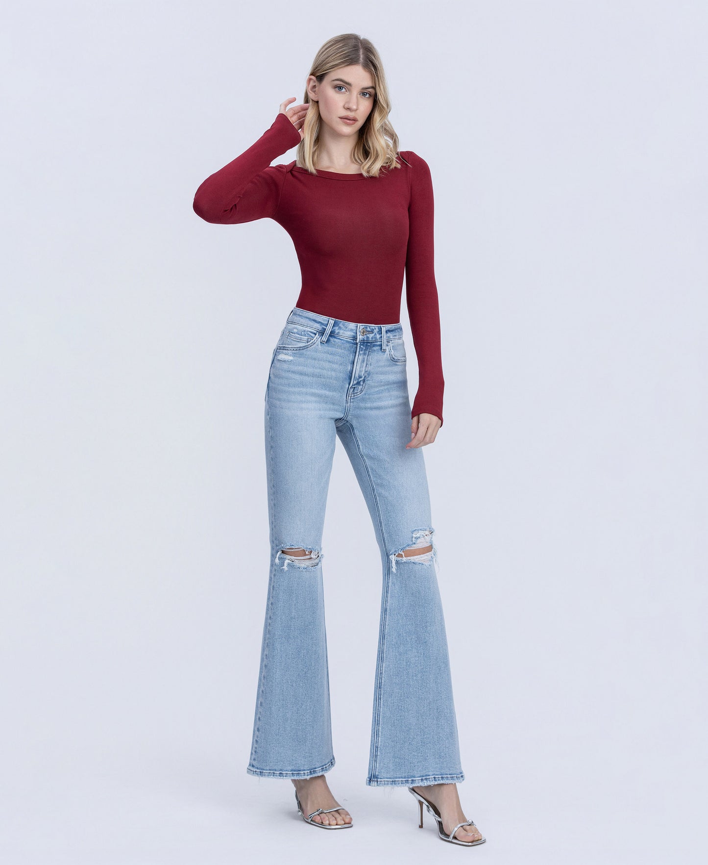 Right 45 degrees product image of York - High Rise Distressed Easy Flare Jeans