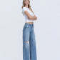 Right 45 degrees product image of Enchanting - High Rise Distressed Wide Leg Jeans