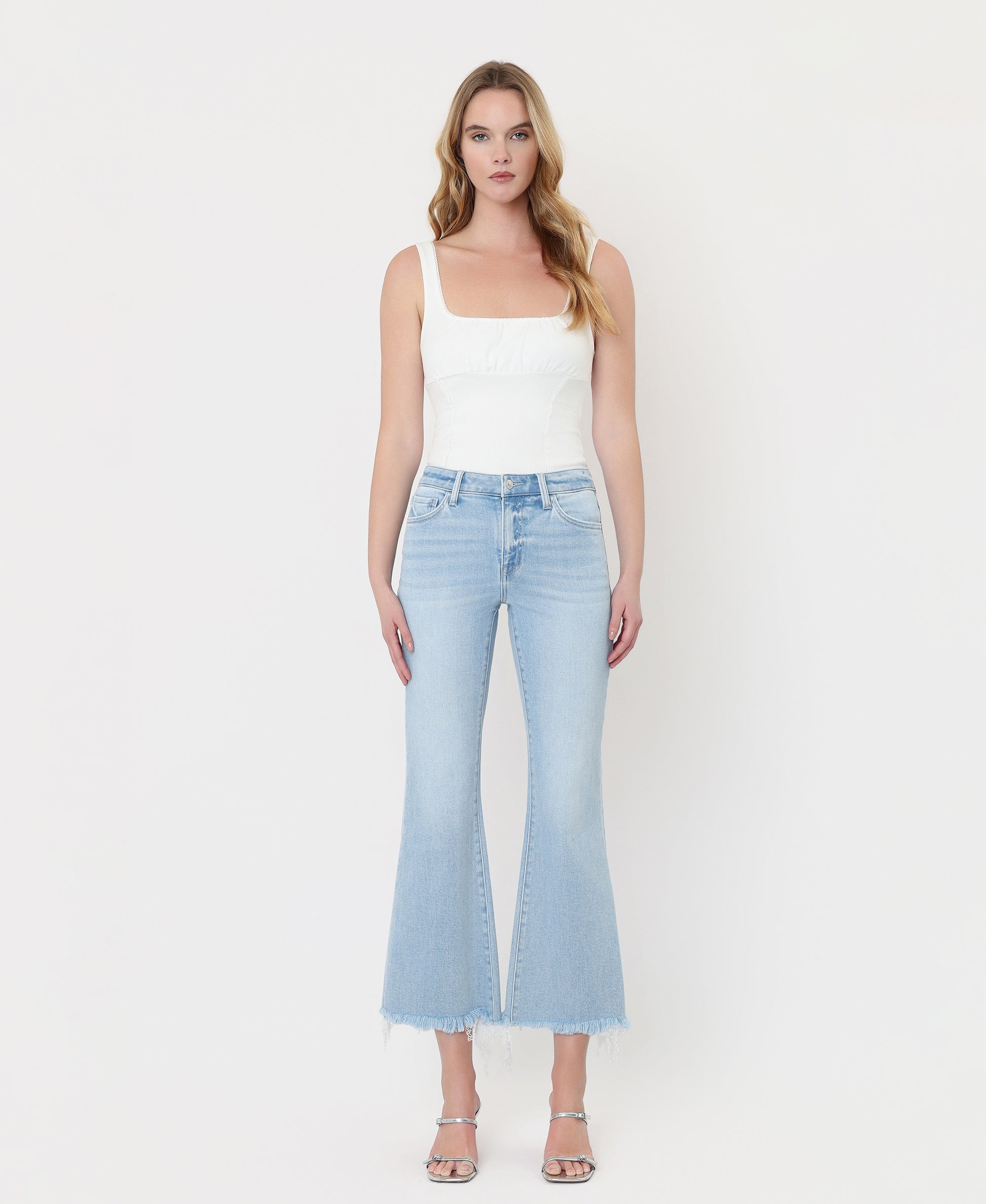 Front product images of Charm - High Rise Uneven Frayed Hem Crop Easy Flare Jeans
