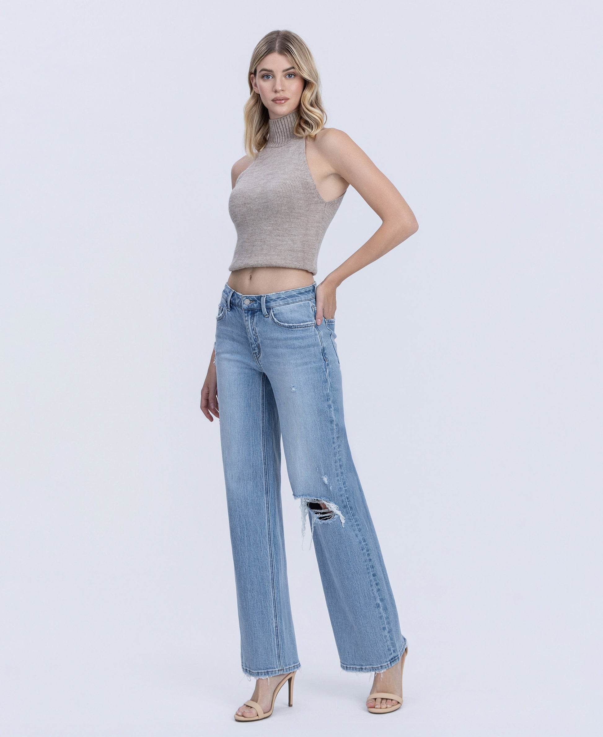 Left 45 degrees product image of Illustrative - Mid Rise Distressed Full Length Wide Leg Jeans