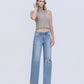 Right 45 degrees product image of Illustrative - Mid Rise Distressed Full Length Wide Leg Jeans