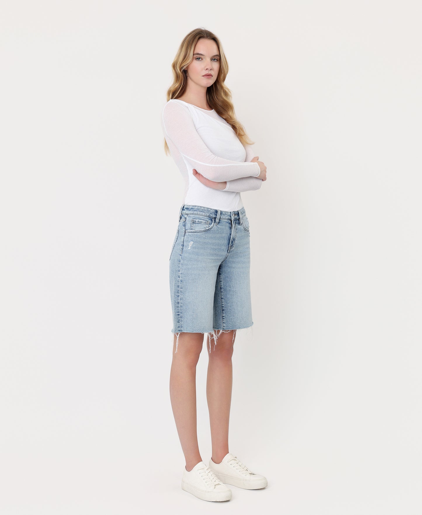 Right 45 degrees product image of Outperform - Mid Rise Raw Hem Denim Jorts