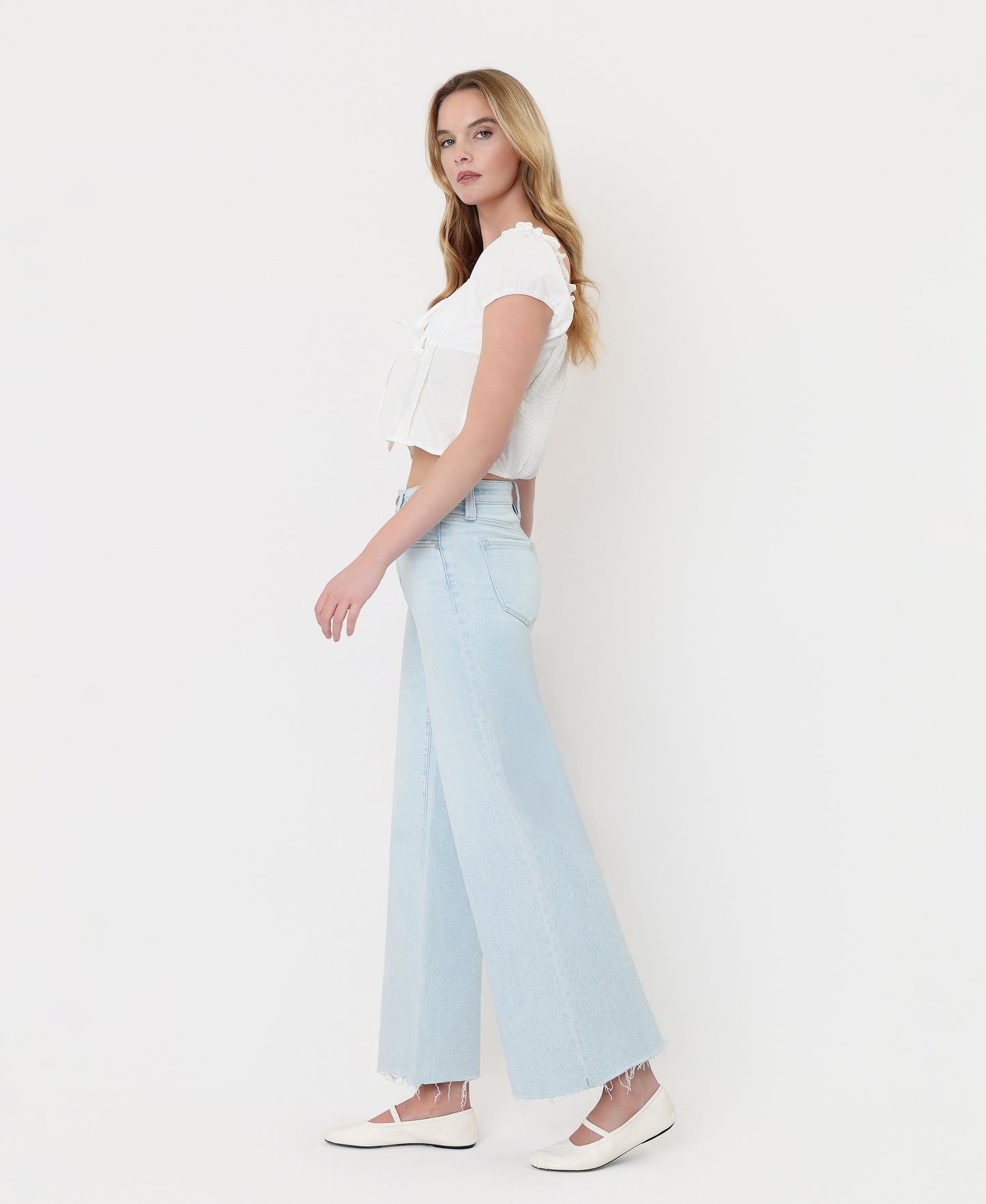 Left side product images of Gainfully - High Rise Clean Cut Raw Hem Wide Flare Jeans