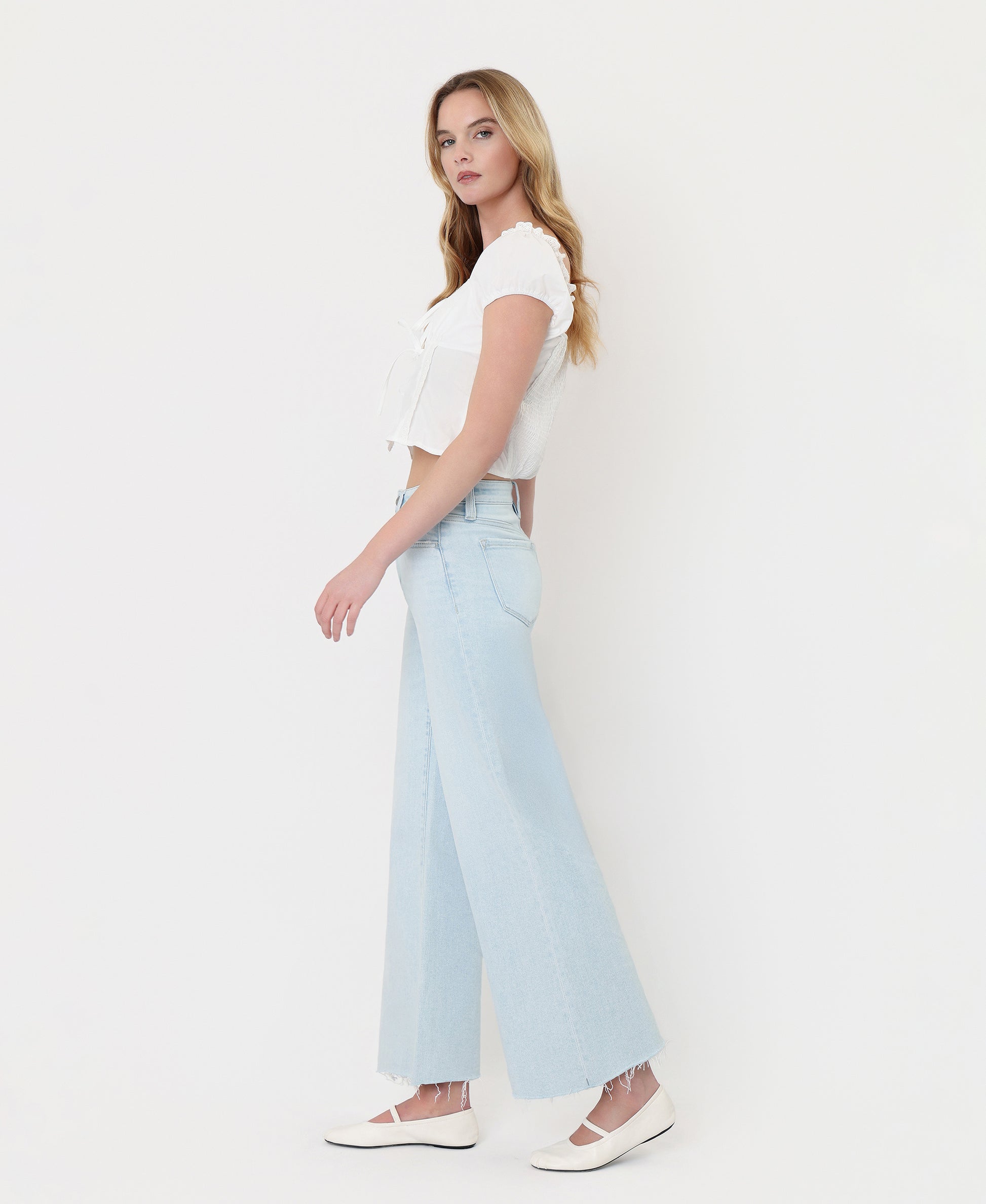 Left side product images of Gainfully - High Rise Clean Cut Raw Hem Wide Flare Jeans
