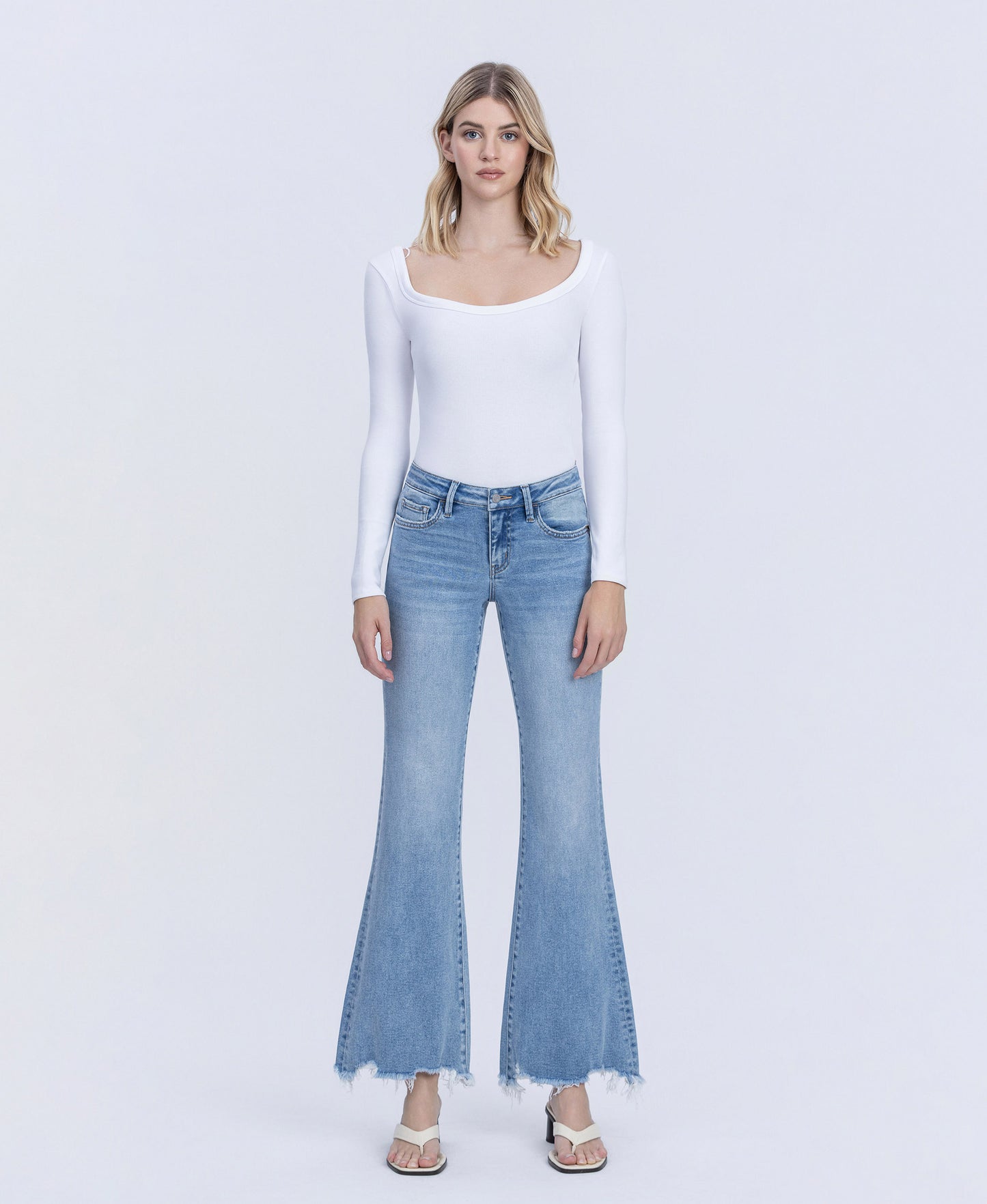 Front product images of Mirage - Low Rise Distressed Hem Easy Flare Jeans
