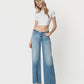 Front product images of Insightful - Low Rise Tinted Wide Flare Jeans