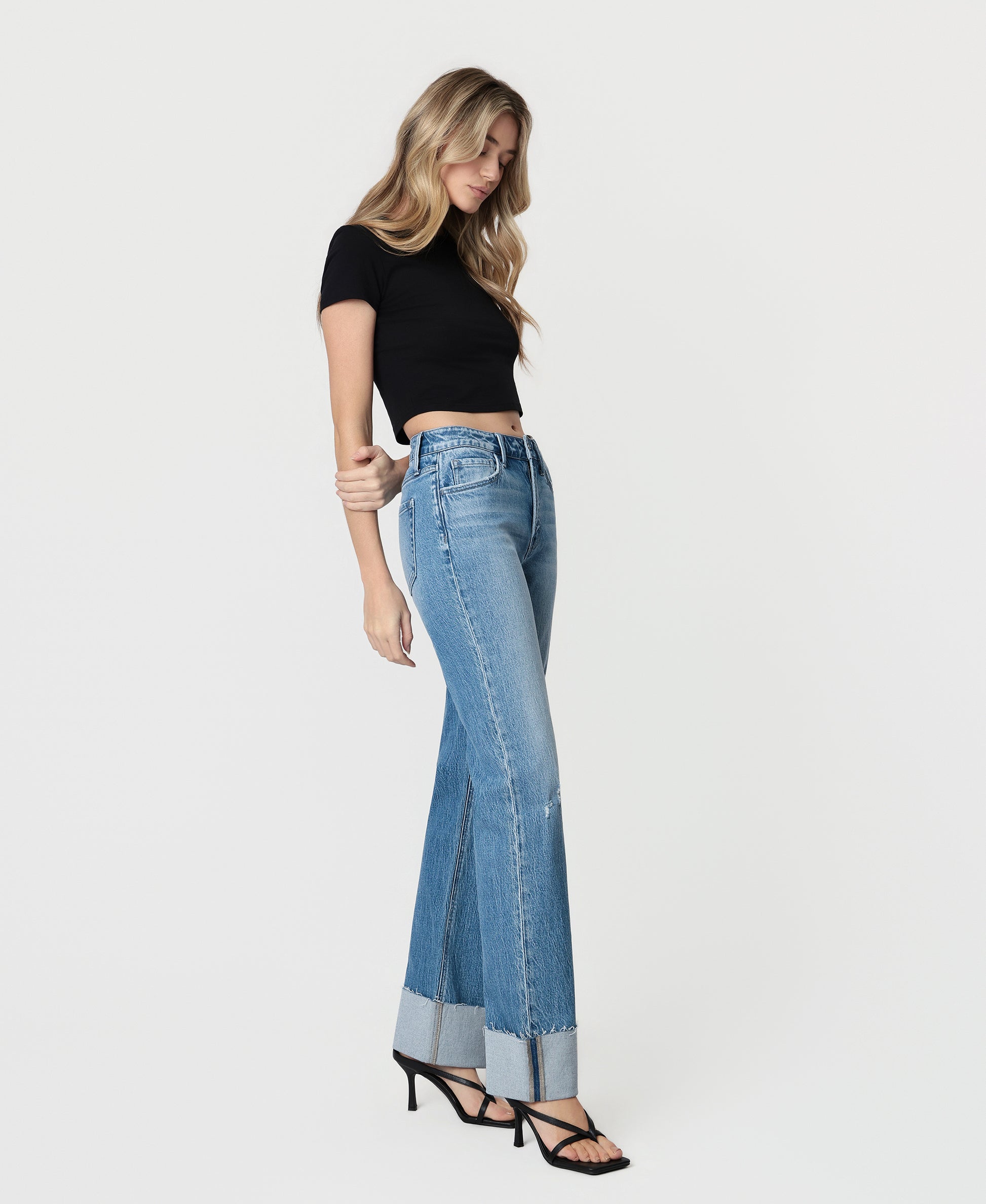 Right 45 degrees product image of Enhanced - High Rise Cuffed Clean Cut Raw Hem Slim Wide Leg Jeans