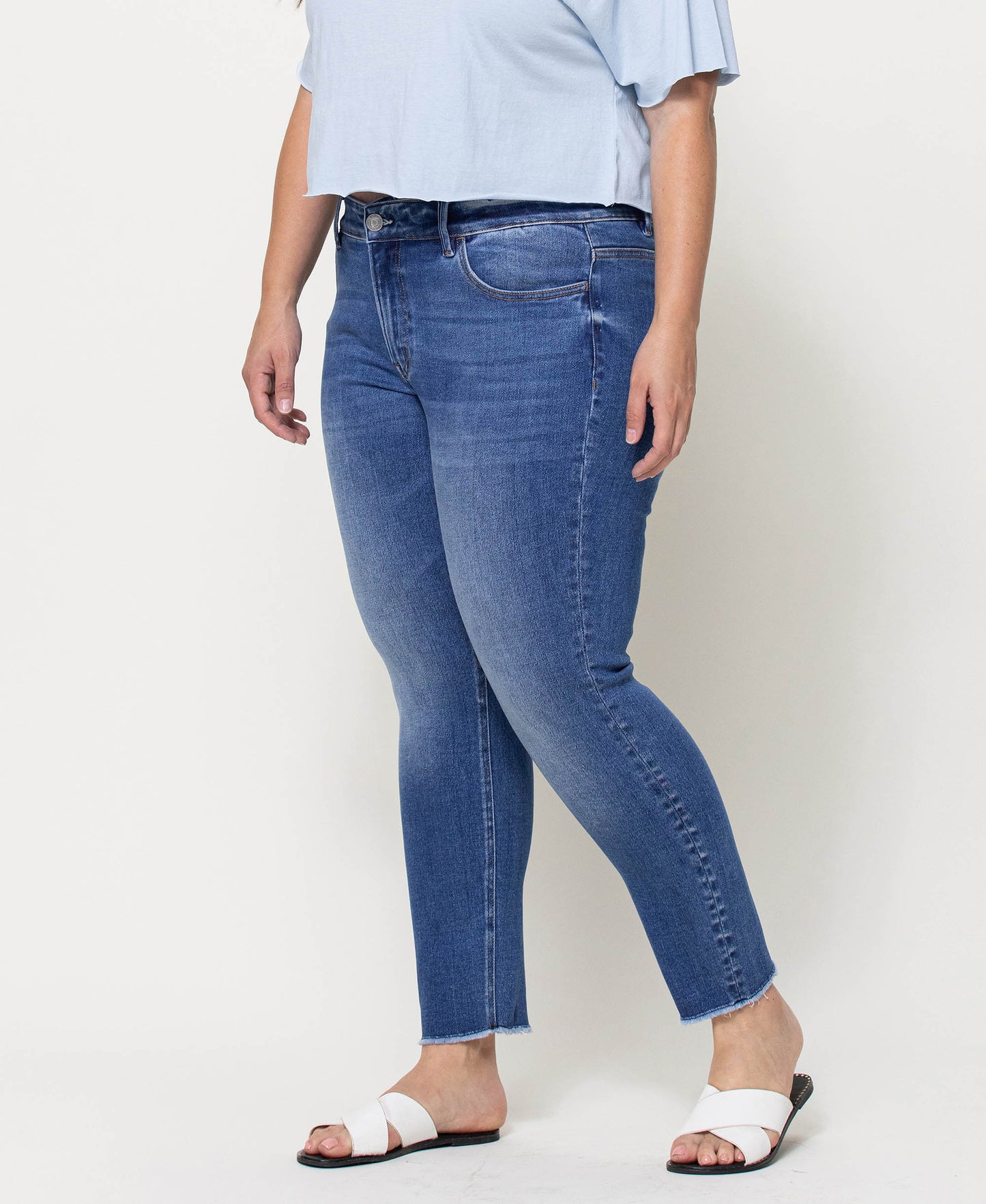 Left 45 degrees product image of Wolf N Crane - Plus Mid Rise Raw Hem Crop Skinny Jeans